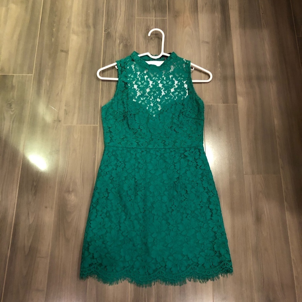 Bodycon Green Lacy Mini Dress with revealing back